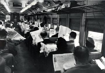 newspaper in train.jpeg